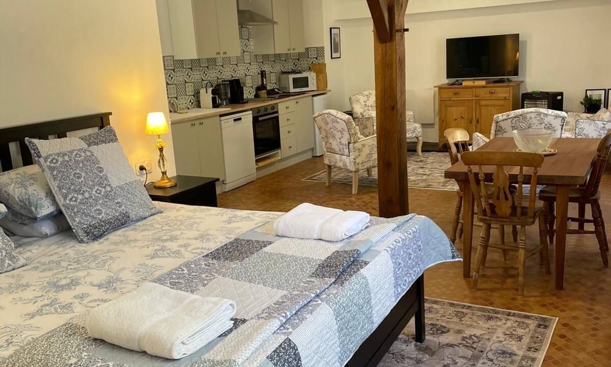Badefols-d'Ans Apartment | Bright and cozy open-plan studio combining rustic charm with modern comfort.