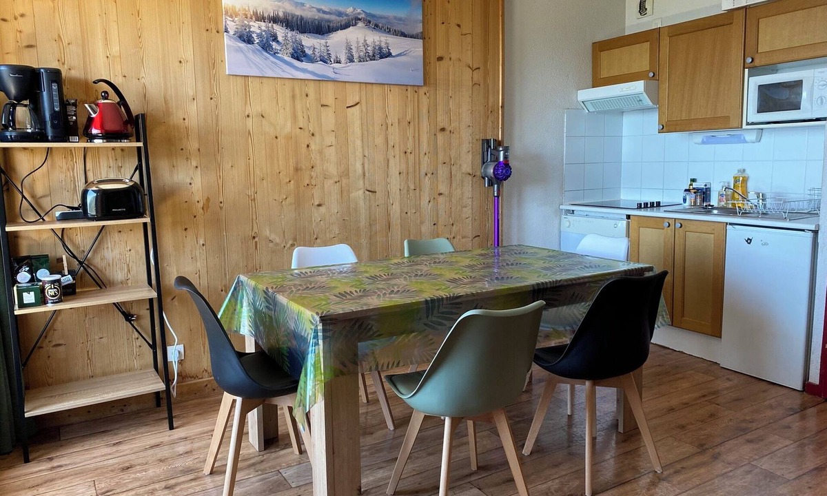Montgellafrey Apartment | South-facing, large living room, mountain views and private covered parking.