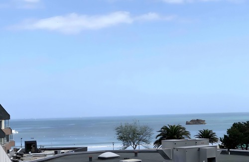 Perros-Guirec Apartment | Apartment 'Hortensia By Madame Est Servie' with Sea View, Balcony and Wi-Fi