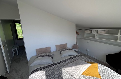 Moretel-de-Mailles Bed & Breakfast | Bedroom and living room in stone house