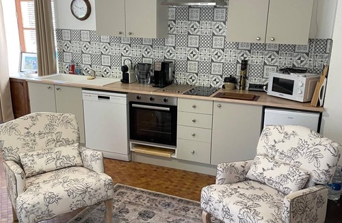 Badefols-d'Ans Apartment | Bright and cozy open-plan studio combining rustic charm with modern comfort.