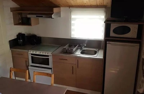 Saint-Martin-de-Queyrieres Ski Chalet | Camping-Caravaneige l'Iscle de Prelles * - Chalet Grand Confort Type Modulo 24 - 24 m2/2 bedrooms - Covered terrace 15 m2 6 people