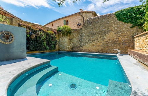 Collias Apartment | Indigo Room with Shared Pool, Wi-Fi & Air Conditioning