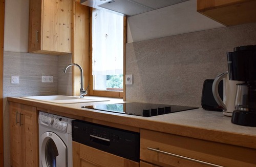 Meribel Centre Apartment | Ski-In/Ski-Out Apartment with Fireplace and Balcony in Méribel