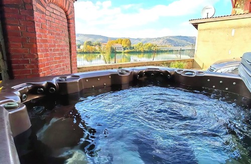 Saint-Vallier Apartment | Spacious vacation rental for 8 people with a spa, a courtyard, and breathtaking views of the Rhône River and the mountains.
