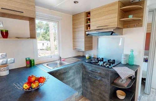 Lattes House | ZEcamping 4 étoiles animé toboggans pet friendly mobil-home clim 36m2