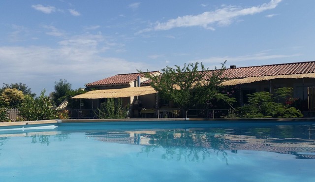 Large air-conditioned family home in quiet enclosed garden with secure swimming pool
