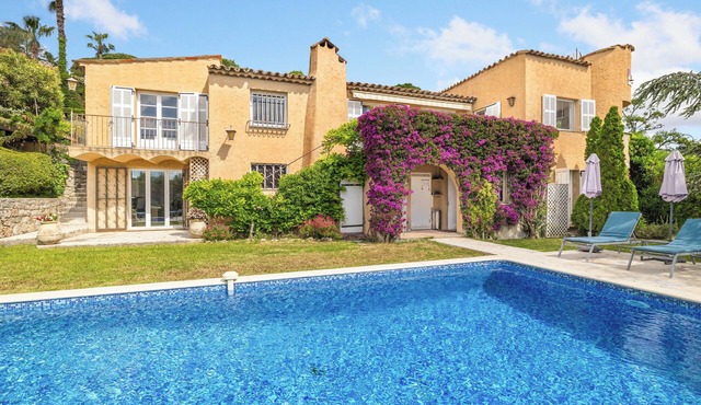 Villa with swimming pool, garden, distant view of Cannes sea and hills